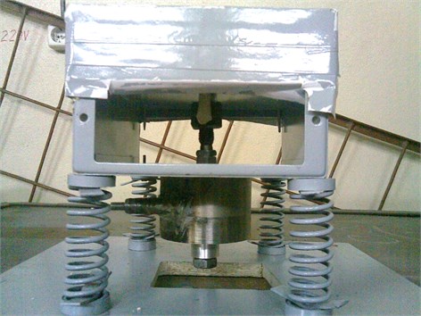 Experimental vibration exciter for studying the process of inertia vibroabrasive machining