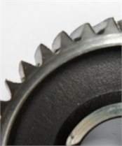 Different conditions of first gear: a) healthy; b) wear in gear; c) broken gear