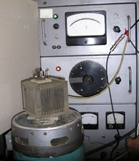 Picture of experimental equipment а) and scheme of electrostatic fixing device b)