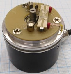 Second modification of piezoelectric high resolution rotary table: a) photoelectric angular position encoder A58-F-10240-5V, b) without rotating part, c) angular position registration device CS 3000; resonant frequency – 42.1 kHz, harmonic excitation amplitude – 10 V
