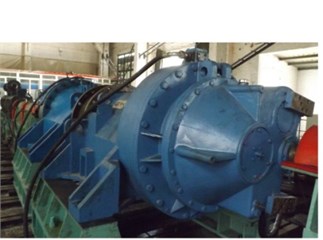 a) FL600 wind turbine gearbox, b) the internal structure of the gearbox