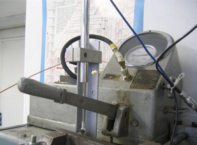 View of laboratory test stand and hydraulic pump