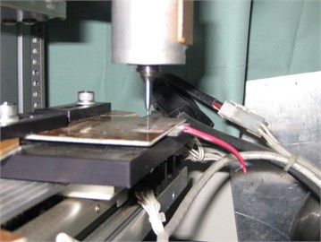 The experimental setup of vibration amplitude and cutting  force measurement during drilling