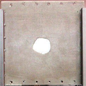 Overall view and magnification of the tested plate