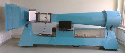 Test stand for pressure drop experiment: a) “AEROLAB” wind tunnel, b) air filter housing  with installed air filter with new design inner liner model
