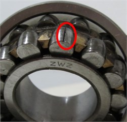 View of spherical roller bearing in normal and three faults conditions