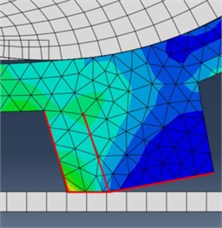 Lug deformation in contact  with a stiff track