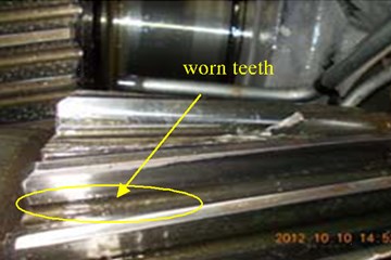 The worn and broken teeth faults in third level gear