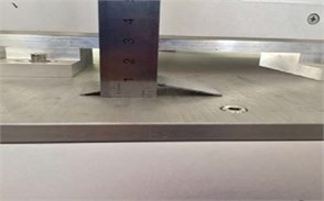 Experimental setup: a) clamping, b) spring back measurement before laser, c) laser irritation,  d) spring back measurement after laser