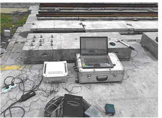 Modal test system for detecting damage