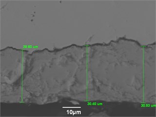 Microphotographs of two (2) samples with external oxide scale of various thickness with their corresponding chemical analysis. A solid EMAT signal was obtained for the sample on the a) while the sample on the b) has produces only a sparse signal. This was most probably due to lack of adherence between the scale and parent metal in the b) sample [13]