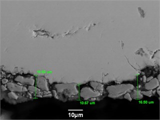 Microphotographs of two (2) samples with external oxide scale of various thickness with their corresponding chemical analysis. A solid EMAT signal was obtained for the sample on the a) while the sample on the b) has produces only a sparse signal. This was most probably due to lack of adherence between the scale and parent metal in the b) sample [13]
