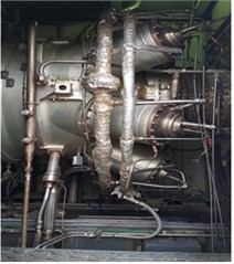 a) Ten-step compressor, b) fracture and wear of compressor blades