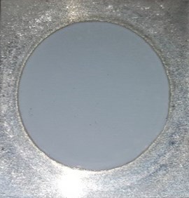 Photo a) and surface morphology b) of nanoporous aluminium oxide membrane