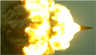 Photograph of max. area muzzle flame after projectile leaving muzzle brake