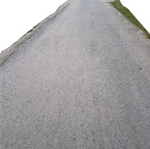 Photos of a) good and b) bad condition road surface used in the test