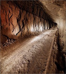 Photos of a) good and b) bad condition road surface in the underground mine