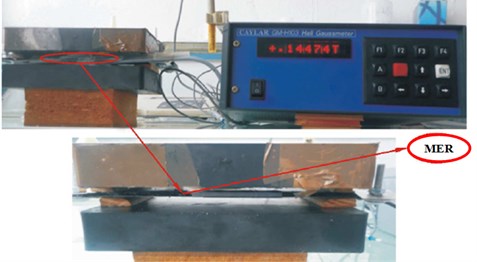 Device for manufacturing elastomer beams loaded with 25 % by volume of iron particles