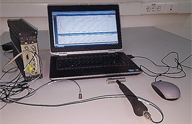 Instrumentation setup consisting of impact hammer, accelerometer,  data acquisition unit and lap-top