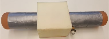 The brick of foam with a PSE inserted inside