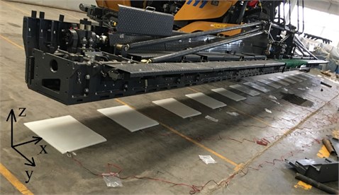 The actual structure of the asphalt paver and its experimental setup process