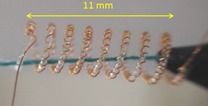 a) Shortest fabricated TCPM (L0= 11 mm), b) fabricated stepper TCPM  with its experimental accessories