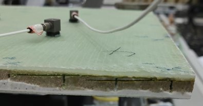 Experiment platform and delamination damage of composite plate