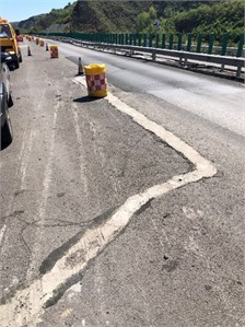 The subsidence of the subgrade caused the road surface to crack