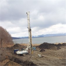 a) Bored pile drilling, b) installation of rebar cage, c) static loads test (Max 600 ton/pile)