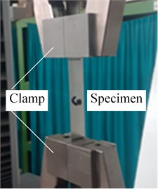 Clamping of specimens for tensile and tear testing