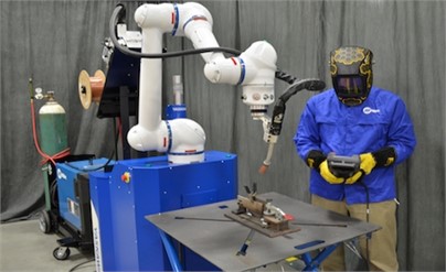 Cobot performing welding operation [72]
