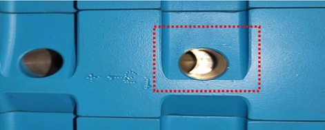 The locally blocked ventilation hole. The vent hole is partially blocked due to thermal expansion different of rotor and damping strip materials