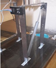 a) Location of the module at node 2 – damped gantry, b) plot obtained from test