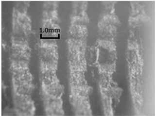 The comparison of micro-morphology of thread pull-off: a) M-type thread, b) T-type thread