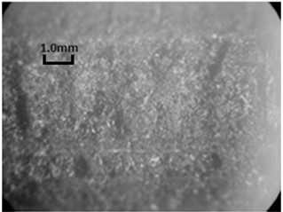 The comparison of micro-morphology of thread pull-off: a) M-type thread, b) T-type thread