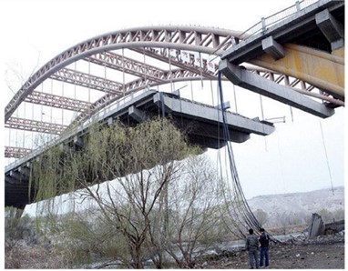 Examples of bridge accidents: a) Morandi Bridge in Genoa, Italy,  b) Kongquehe Bridge in Korla, China