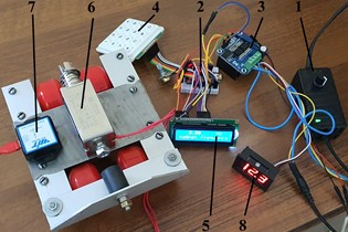 Full-scale laboratory prototype of the robot with the solenoid-type actuator and control system