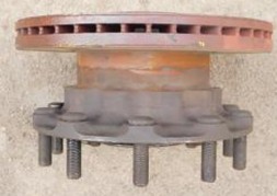 BD’s structure: a) disc area, 1-Hub, Forward, Backward, b) damaged backward disc, c) worked BD