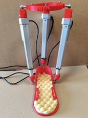 Prototype evolution of the Almaty ankle exoskeleton: a) initial V.1 prototype; b) improved and modular V.2 prototype
