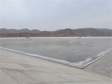 On site photo of regulated reservoir. Photographs were taken at the Hongguangou regulated reservoir site, Zhongwei City, Ningxia Hui Autonomous Region, China, by J.Y. Niu on 15 January 2024