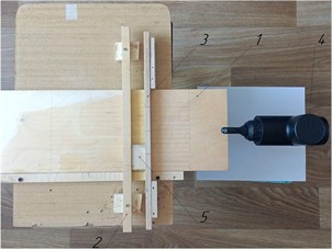 General view of the laboratory setup: 1 – platform; 2, 3 – walls; 4 – vibration exciter; 5 – body