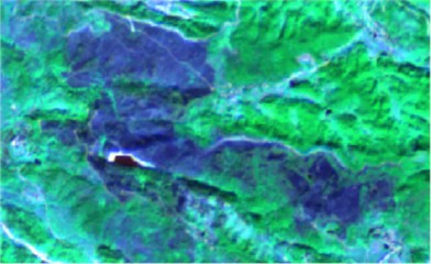 Sentinel-2 false color composite images a) before and b) after the fire