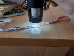 Experimental set up for microscopic characterization of the weld interface using a USB digital microscope; microstructure of the ultrasonic weld interface at 50x magnification showing the fibre-polymer interface. Photos by O. Khudoynazarov, TITLI Materials Testing Laboratory, Tashkent, Uzbekistan, December 2023