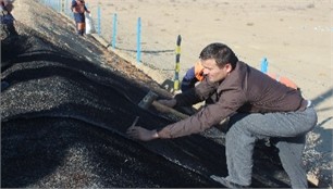 Installation of Geomats on the Slope at Qorlitog’-Kiyikli Section. Photos were taken  by the article’s author A. Sh. Uralov during field research on the Bukhara-Miskin  railway line (Qorlitog’-Kiyikli section) in November 2024