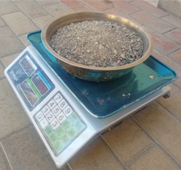 Fine and coarse aggregates used in the experimental research work. Photo taken by Bakhtiyor Maksud Ugli at the Namangan State Technical University Laboratory, March 2025