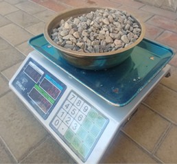 Fine and coarse aggregates used in the experimental research work. Photo taken by Bakhtiyor Maksud Ugli at the Namangan State Technical University Laboratory, March 2025