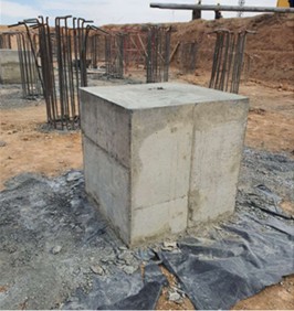 A concrete cube for the test pile’s hydraulic jack placement. Photo taken by the author at the Tebinbulok site on November 13, 2023