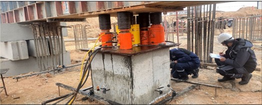 An image of the indicators that were put up to track the testing pile’s movement while it was being tested and the process  of taking counts from them. Photo taken by the author at the Tebinbulok site on December 15, 2023