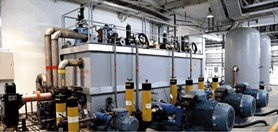 On-site deployment materials collected at Xiangjiaba Hydropower Plant, Yibin, Sichuan, China:  a) governor oil pump room; b) author-prepared schematic of DE and FE sensor placement; c) inspection terminal; (d) handheld field inspection. Panels a), c), and d) are original photographs captured by Ting He during the 2025 pilot deployment; the face in panel d) was intentionally blurred for de-identification