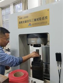 Laboratory geotechnical tests. Photo by Jia Haipeng in 2025 at the Rock Mechanics Laboratory, School of Intelligent Construction, Henan University of Urban Construction